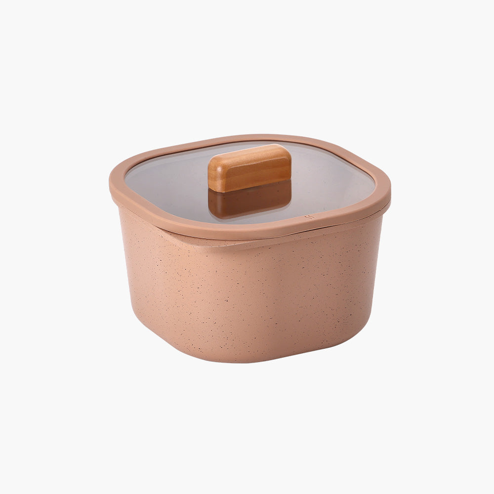 Small terracotta food storage container with a glass lid and wooden handle.

